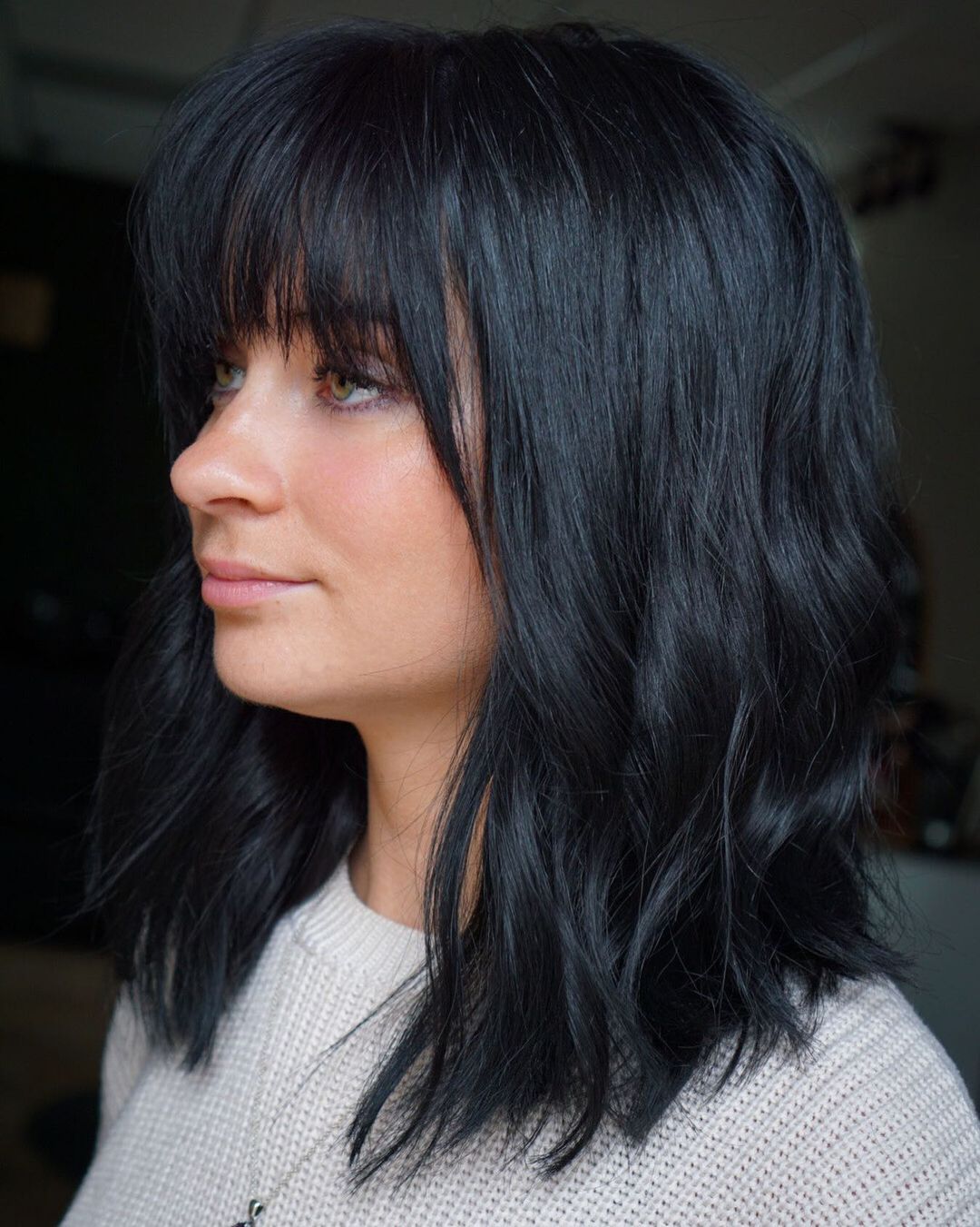 Collarbone Length Black Hair with Wispy Bangs