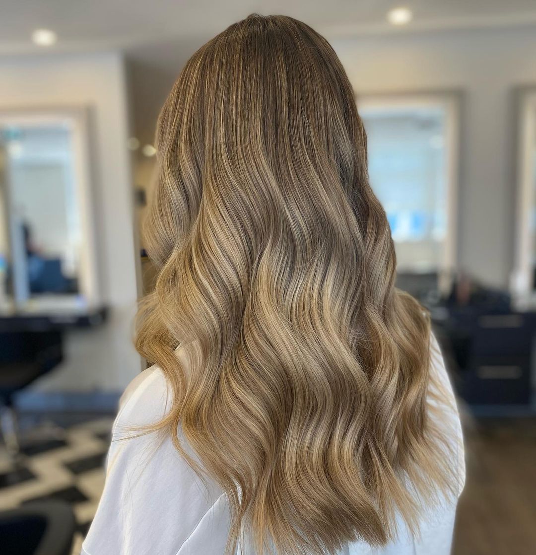 Delicate Highlights on Long Wavy Hair