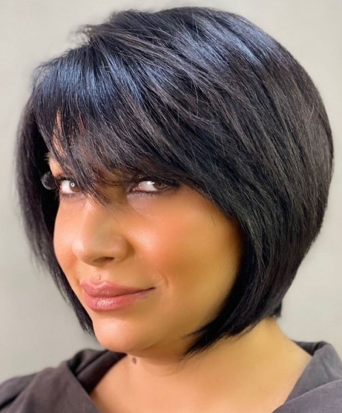 Layered Bob with Side Bangs for Round Faces