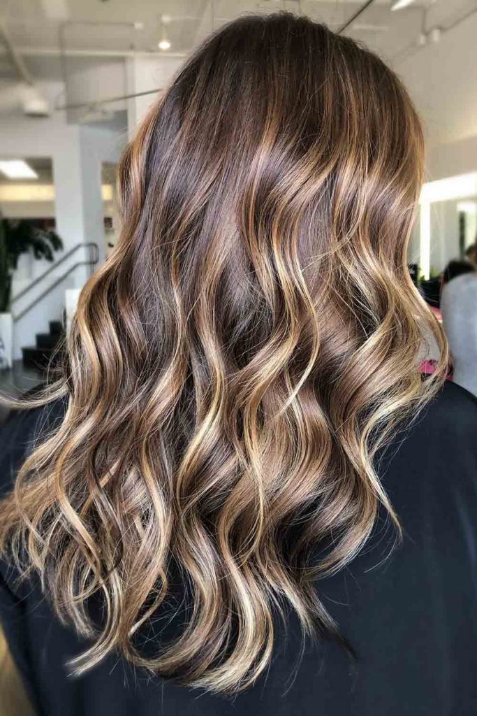 Layered Wavy Locks With Highlights