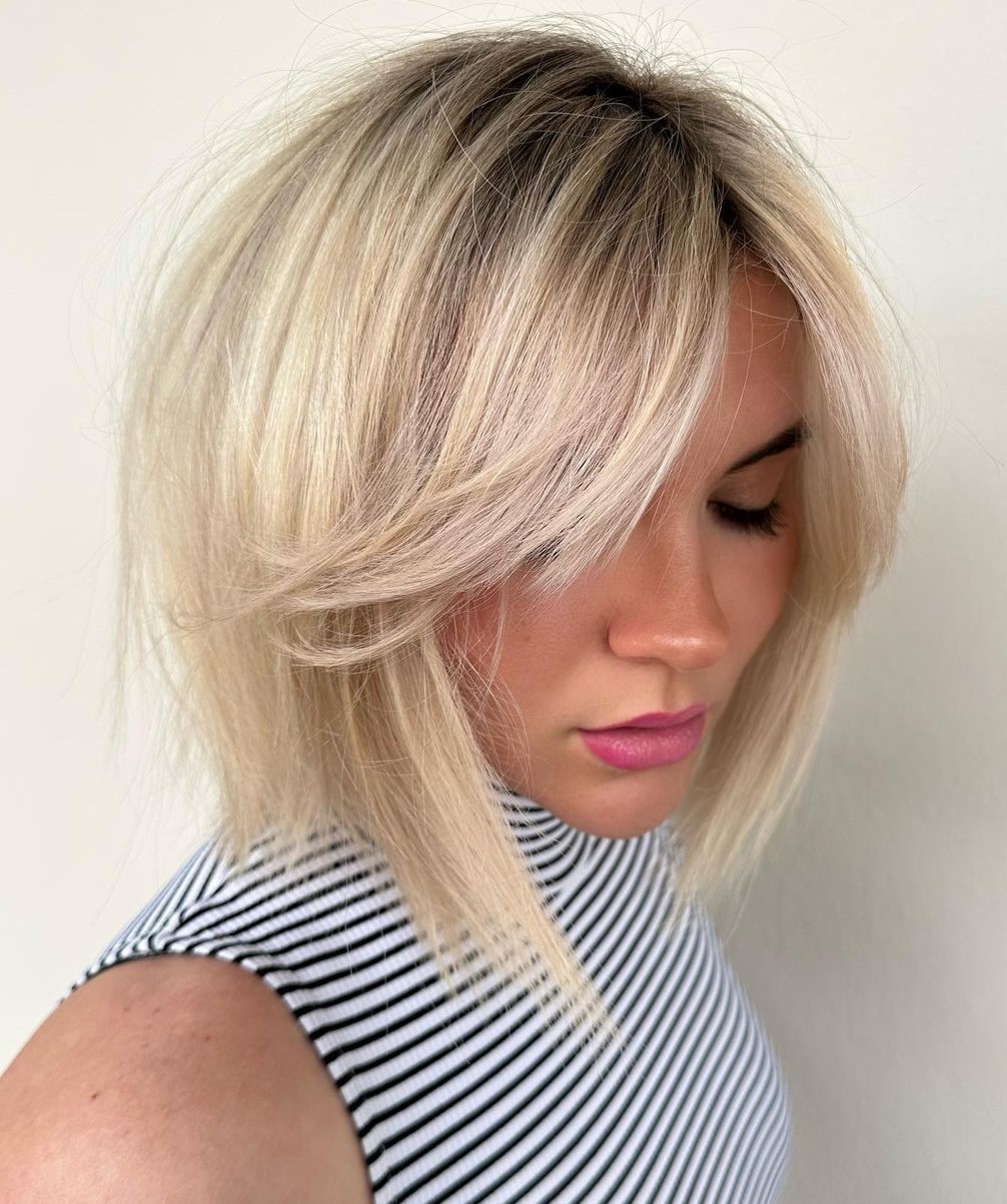 Light Blonde Bob with Feathered Curtain Bangs