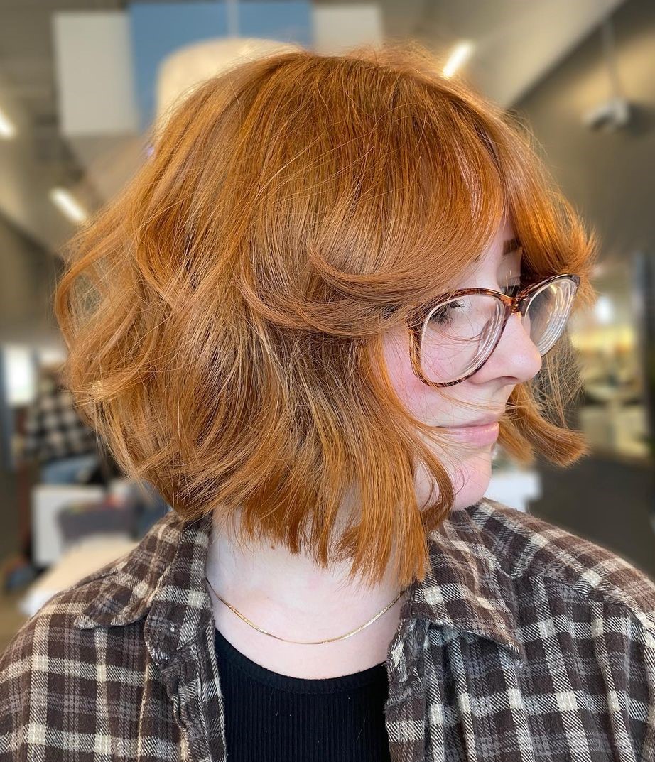 Natural Red Blunt Bob with Messy Texture and Blow Out Bangs