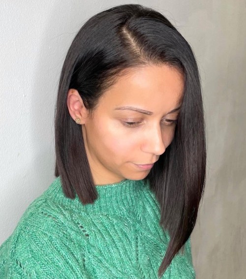 Sharply Angled Bob Haircut Styled with Side Part