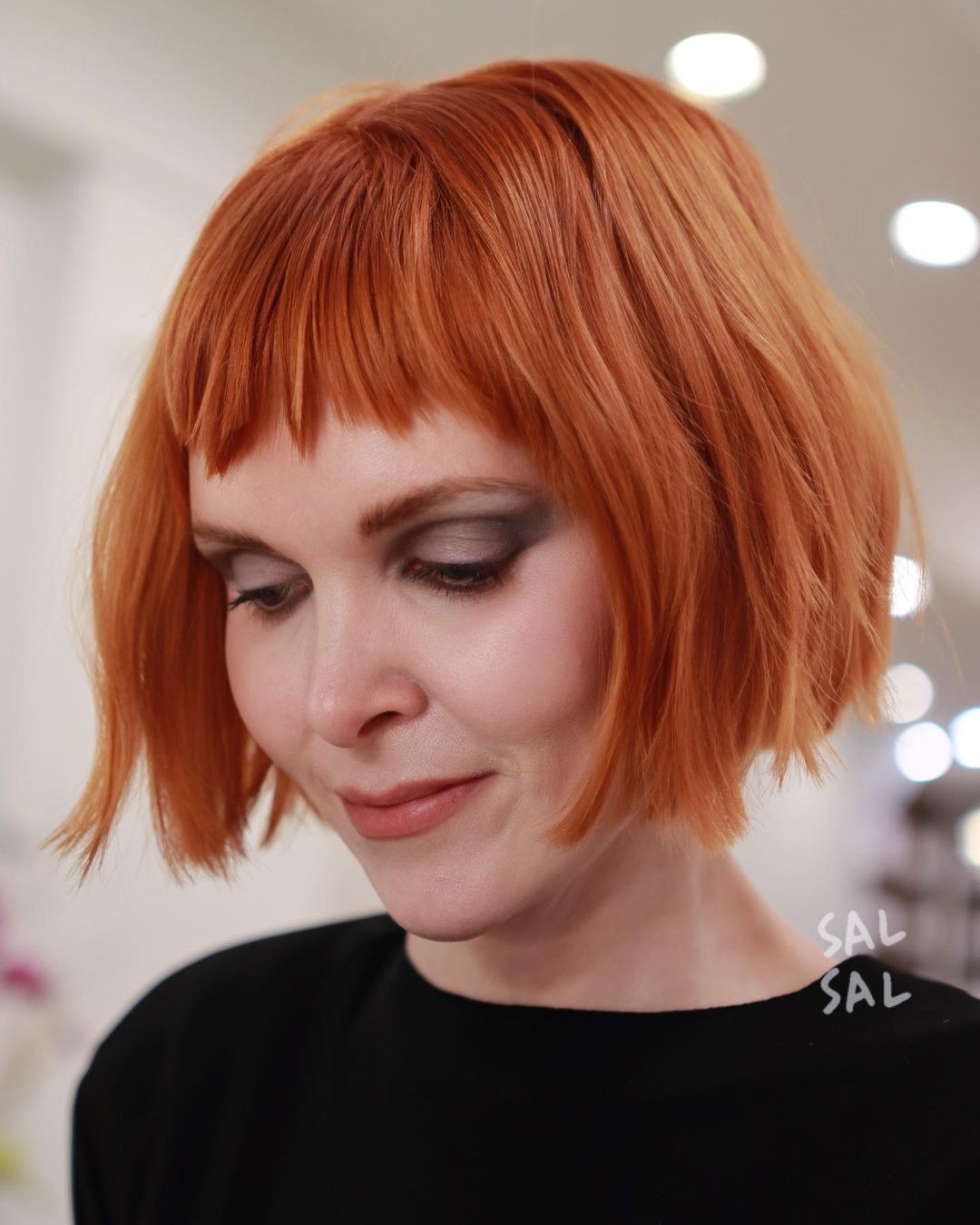 Short Ginger Bob with Choppy Bangs