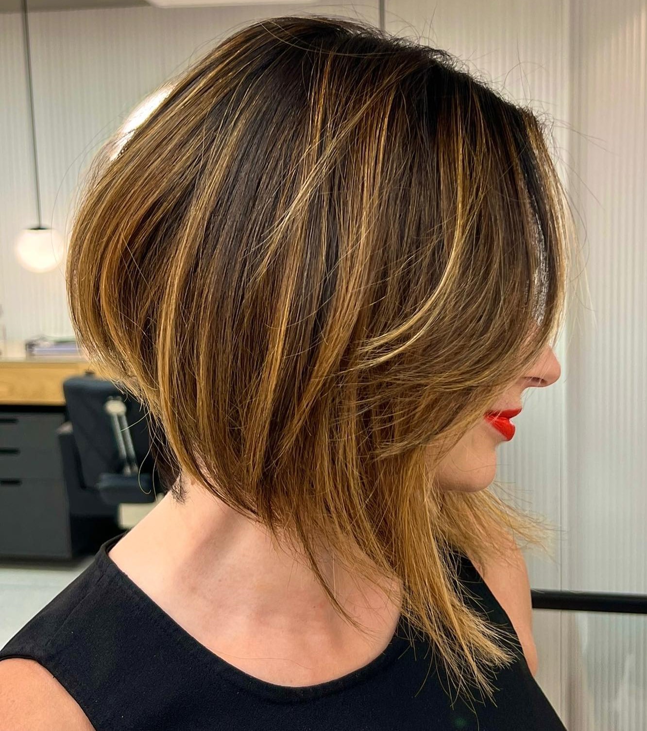 Short Inverted Haircut and Golden Highlights