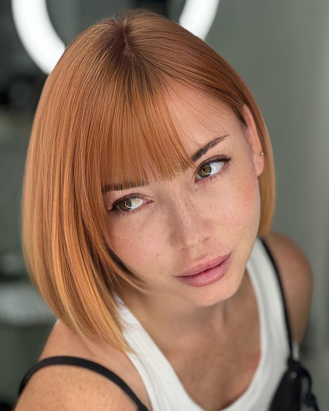 Straight Strawberry Blonde Bob with Thin Bangs