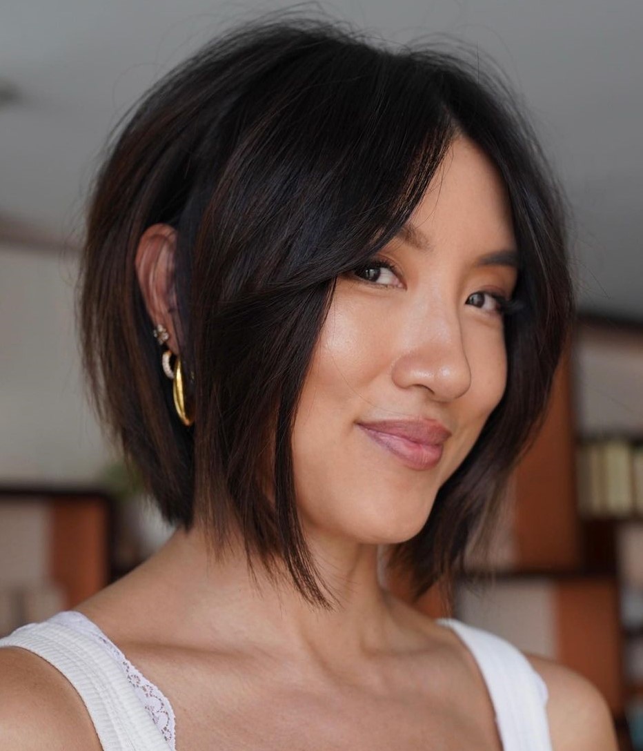 Textured Bob with Soft Curtain Bangs on Brunette Hair