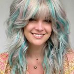 voluminous-blonde-hair-with-green-highlights