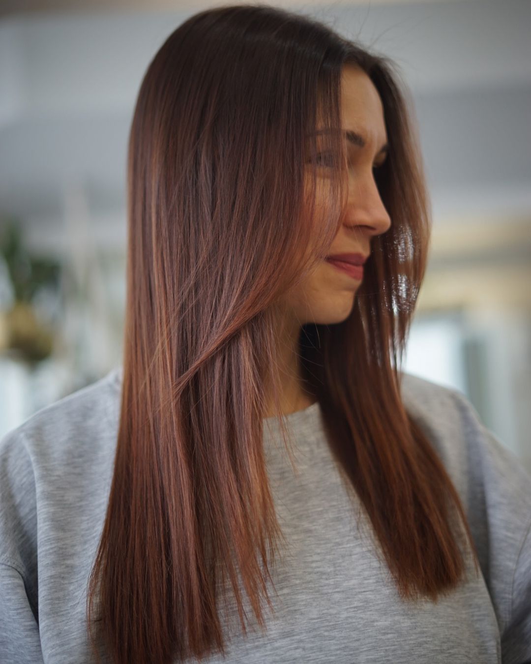 Auburn Haircut with Curtain Bangs