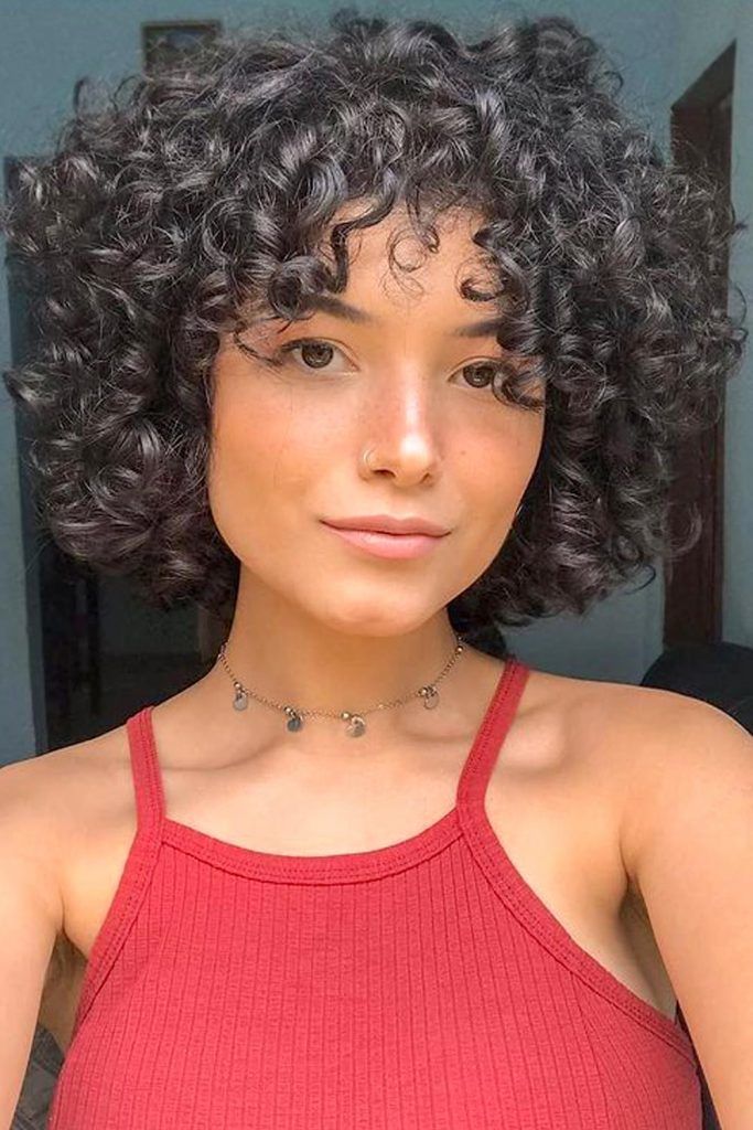 Curly Layered Bob With Bangs #shortcurlyhairstyles #curlyhairstyles #shorthairstyles #hairstyles #bobhairstyles