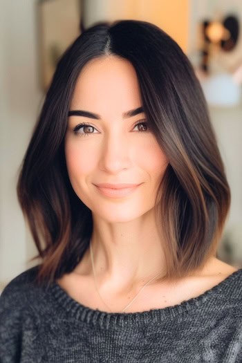 Lob (Long Bob) With Highlighted Ends Hairstyle on smiling woman with brown hair.