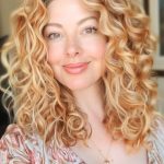 medium-length-voluminous-curls-hairstyle-