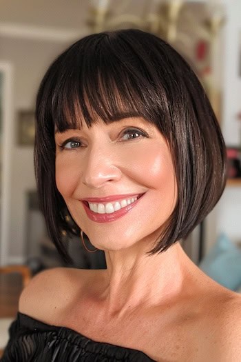 Short Bob With Blunt Bangs Hairstyle For Women Over 40.