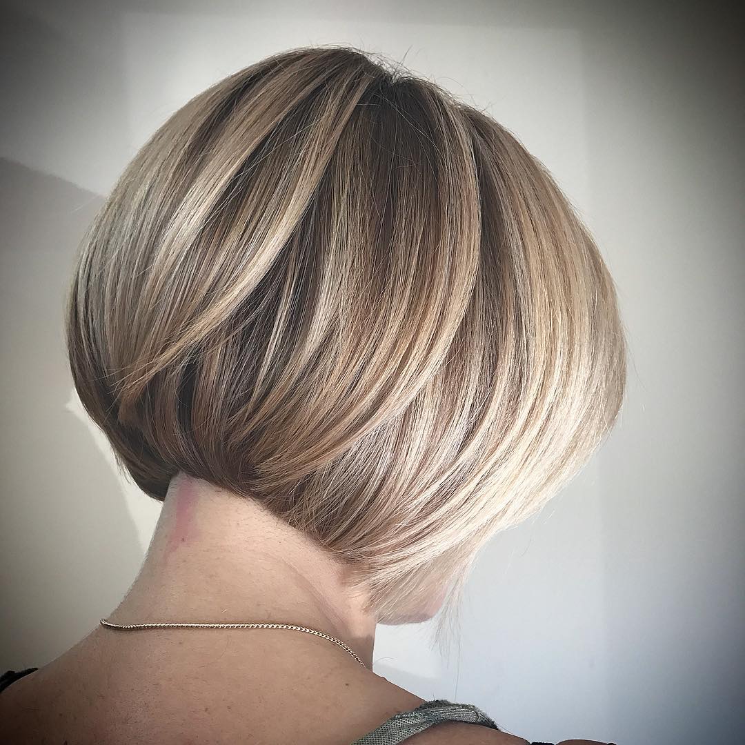 sleek short blonde bob hairstyle