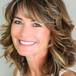 wavy-highlighted-layers-haircut-on-smiling-woman-w