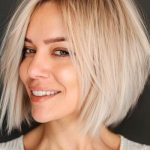 wispy-bob-hairstyle-on-a-smiling-woman-with-blonde