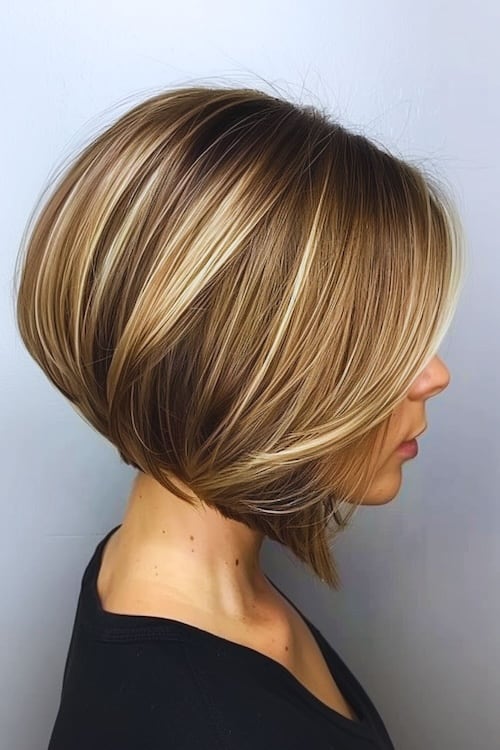 Beige blonde highlights on dark brown hair.