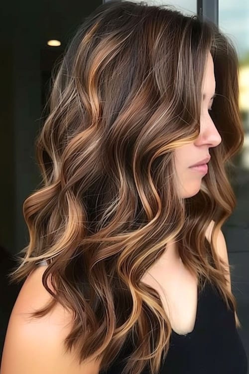 Caramel platinum balayage on dark brown hair