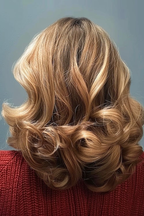 Curled shoulder length layers.