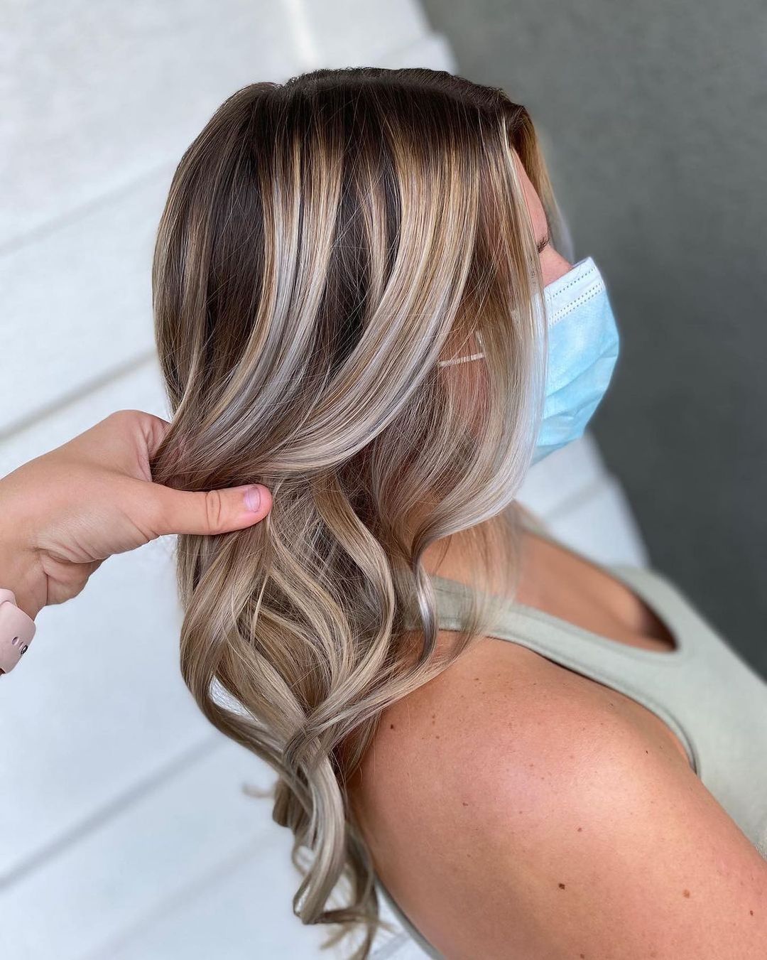 dimensional blonde hair with dark roots