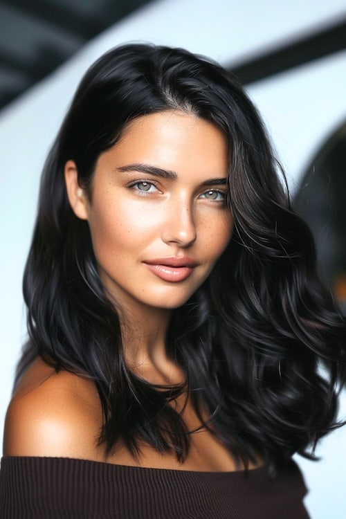 Glossy brown black waves dark brown hair color idea.