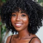 natural-coils-medium-length-hairstyle-with-bangs-