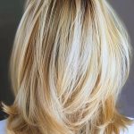 platinum-blonde-voluminous-layers-medium-length-ha