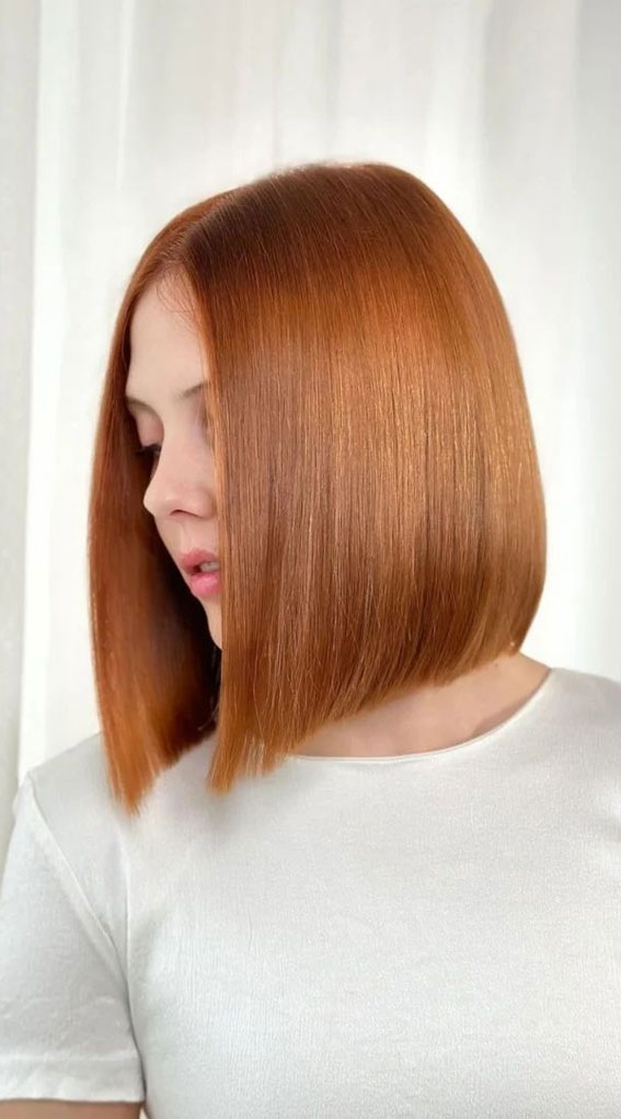 sleek long bob, copper brown angled long bob, medium-length bob