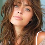 wispy-layers-with-bangs-medium-length-haircut-