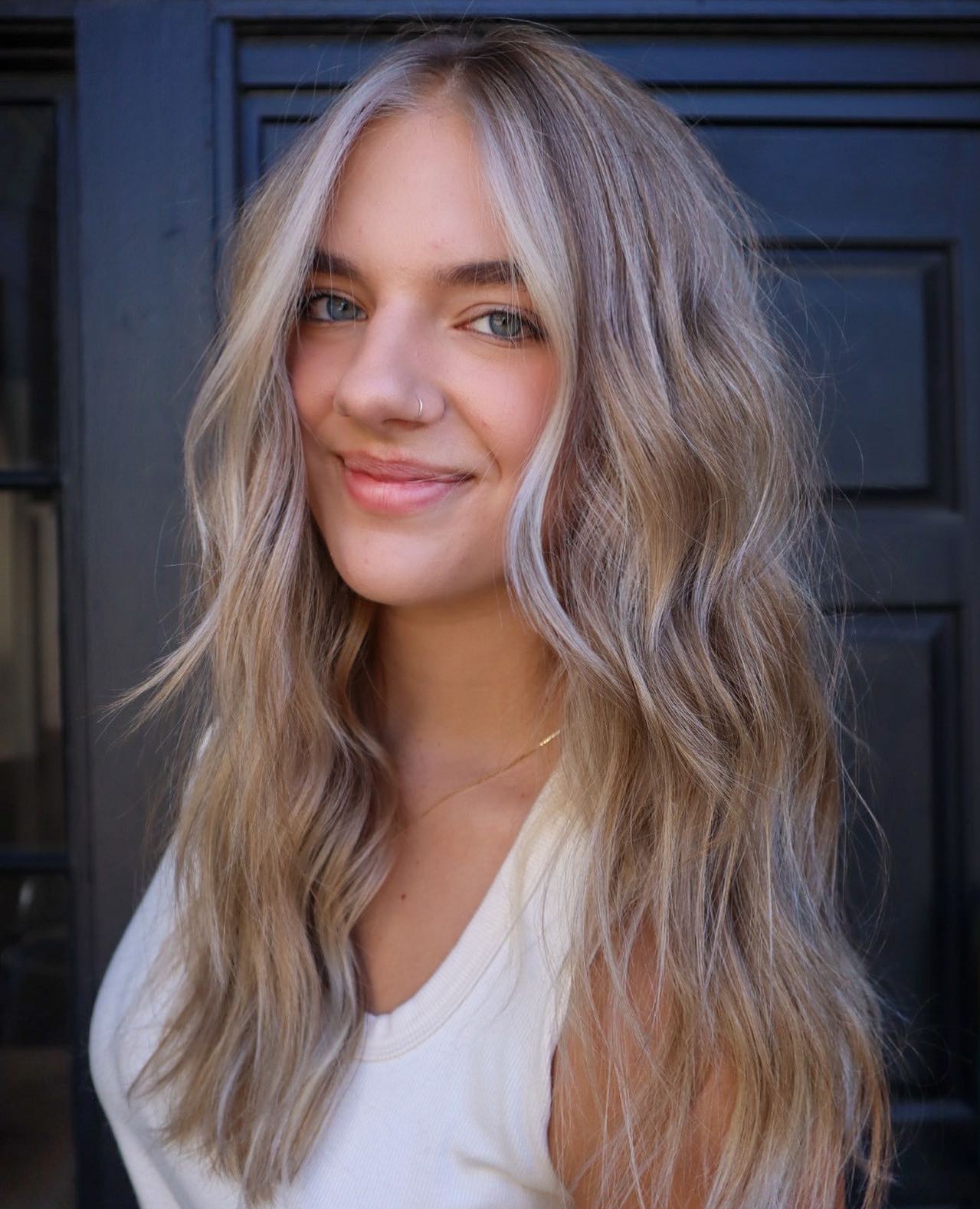 Ash Blonde on Wavy Hair with Highlights