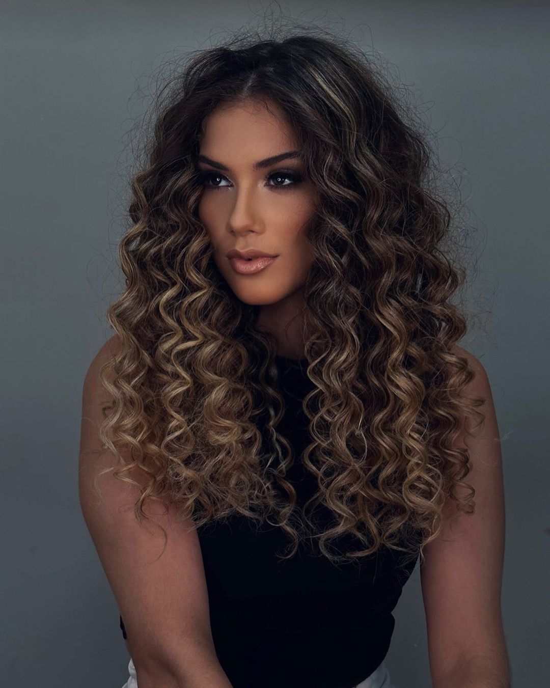 Dark Curls with Abundant Highlights