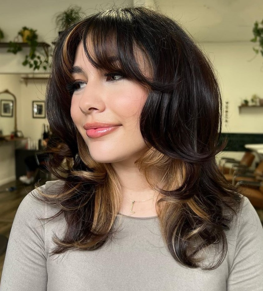 Layered Haircut with Blonde Underlayer Color