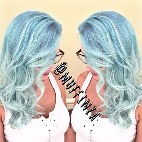 pastel blue wavy hairstyle with subtle highlights 