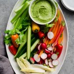 a-large-white-platter-of-sliced-vegetable-crudite