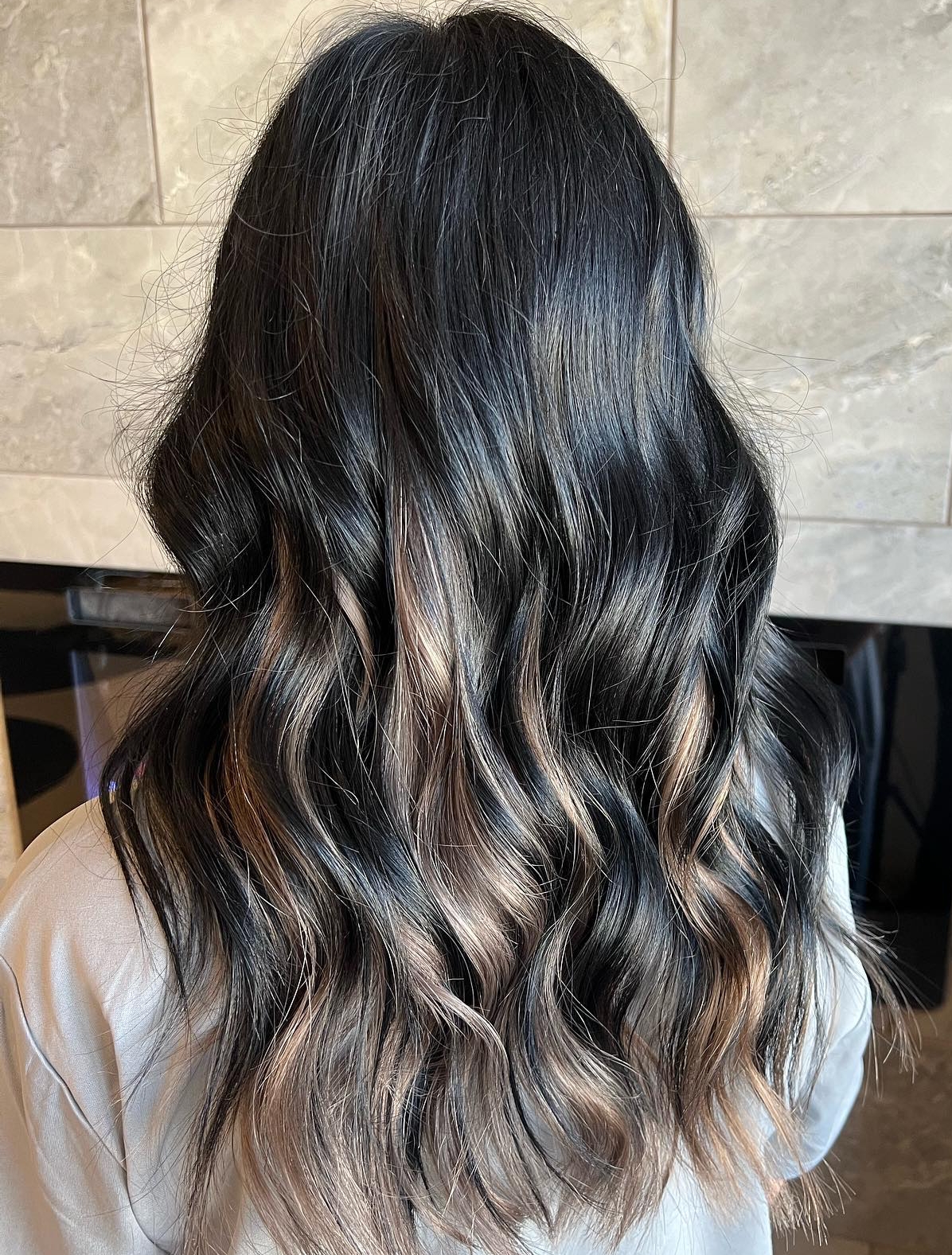 Long Dark Wavy Hair with Peekaboo Highlights