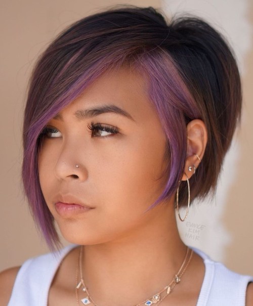 Short Bob with Long Side Bangs and Lavender Face Framing Streaks