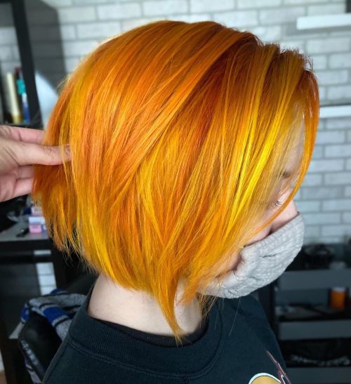 Sleek Ginger Bob with Subtle Yellow Highlights