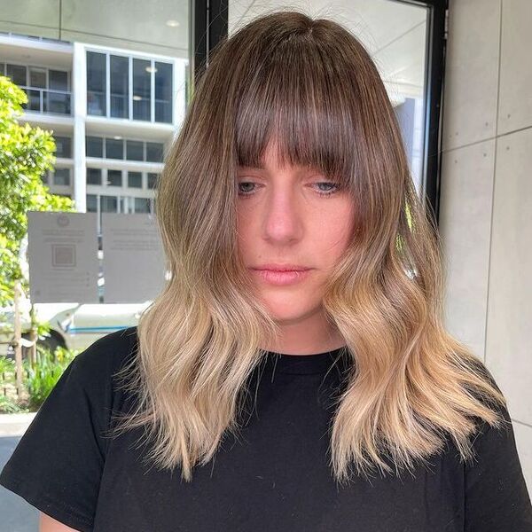 a woman wearing a black shirt