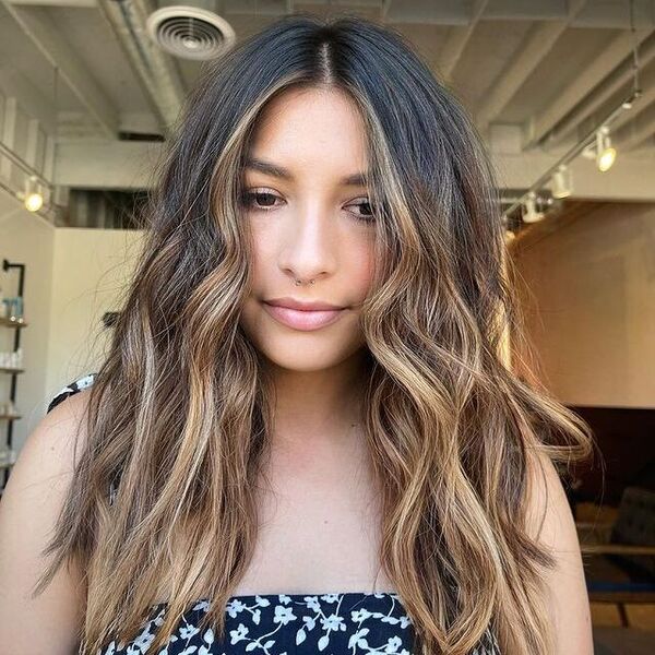 a woman wearing a floral tube top