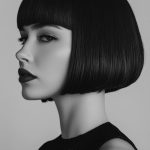 a-woman-with-a-sleek-precision-bob-with-blunt-bang