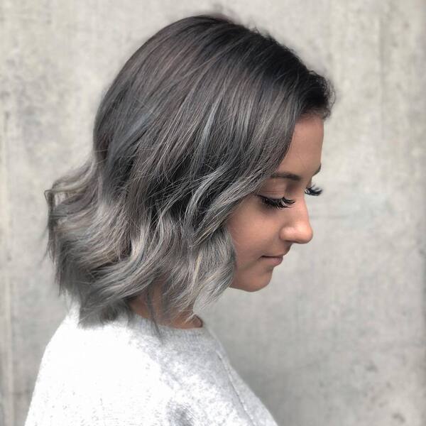 blonde ombre - a woman wearing a white longsleeve