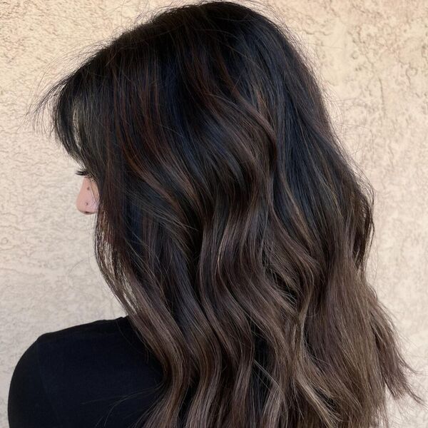 Chocolate on Medium Hair - a woman wearing black top.