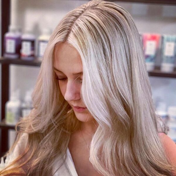 Flash Lift Platinum Blonde - a woman in a salon wearing a white shirt