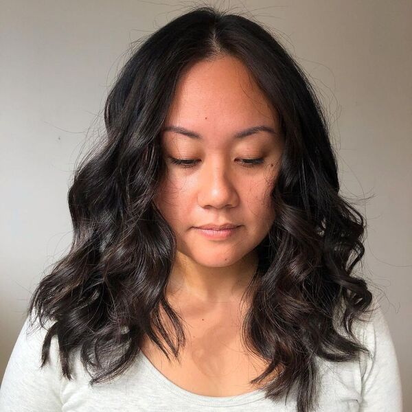 Medium Chocolate Brown Highlights - a woman wearing light gray blouse.