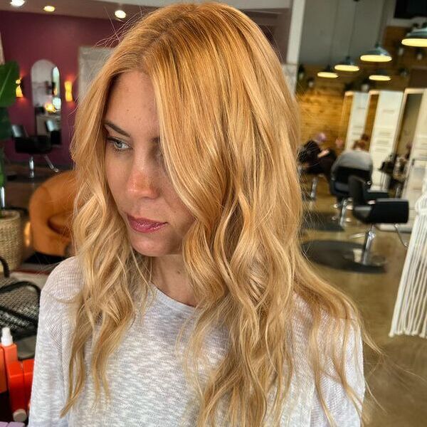 Natural Strawberry Blonde Hair - a woman wearing a white longsleeve