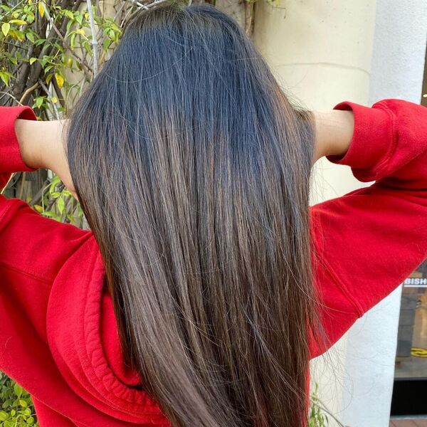 Shag Straight Hair - a woman wearing red hooded jacket.