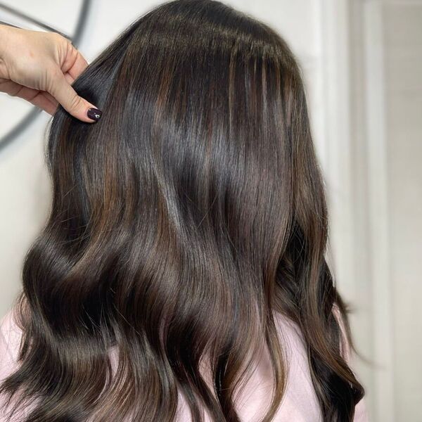 Shiny Brunette Hair - a woman wearing light pink jacket.