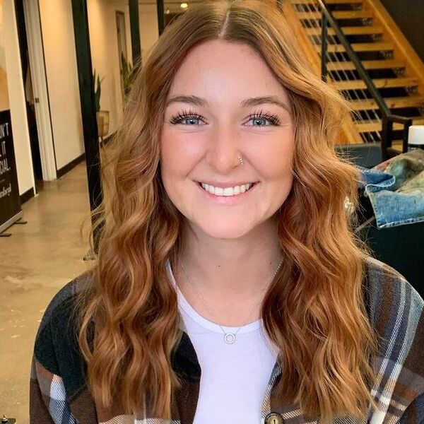 Soft Copper Strawberry Blonde Hair - a woman wearing a checkered longsleeve