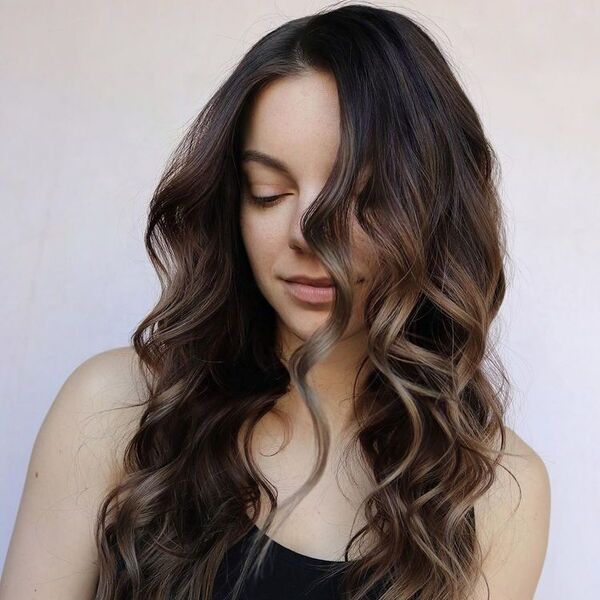 Textured Curls - a woman wearing black tank top.